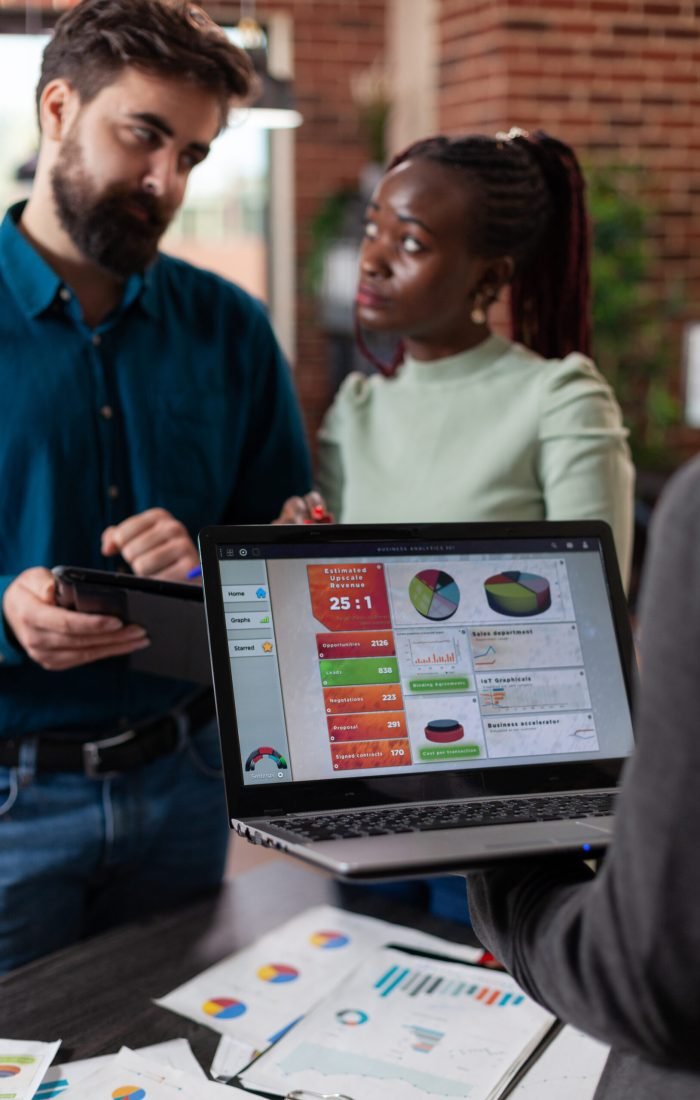 multiracial businesspeople analysing company turnover